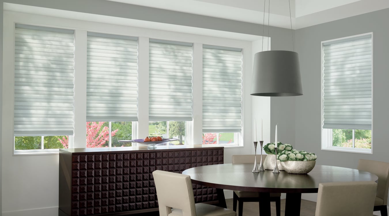 Cordless motorized shades in a Destin dining room